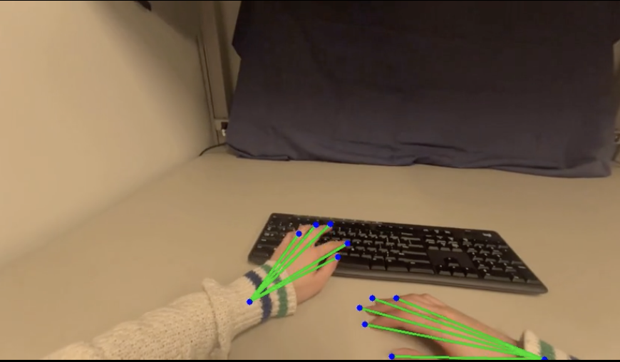 EgoDex frame with left and right hand root and fingertip trajectories